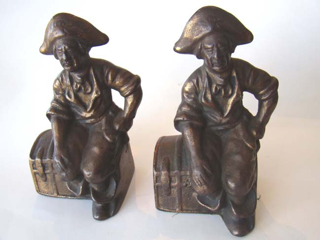 A good pair of cast iron "Pirate sitting on a treasure chest" bookends by Hubley Mfg. circa 1920